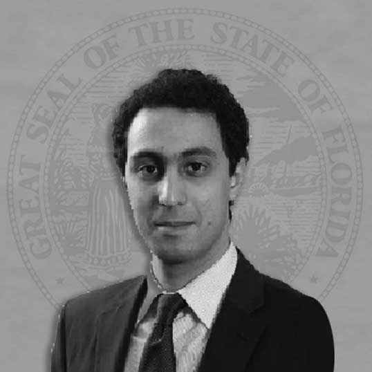 A man wearing a suit and tie
