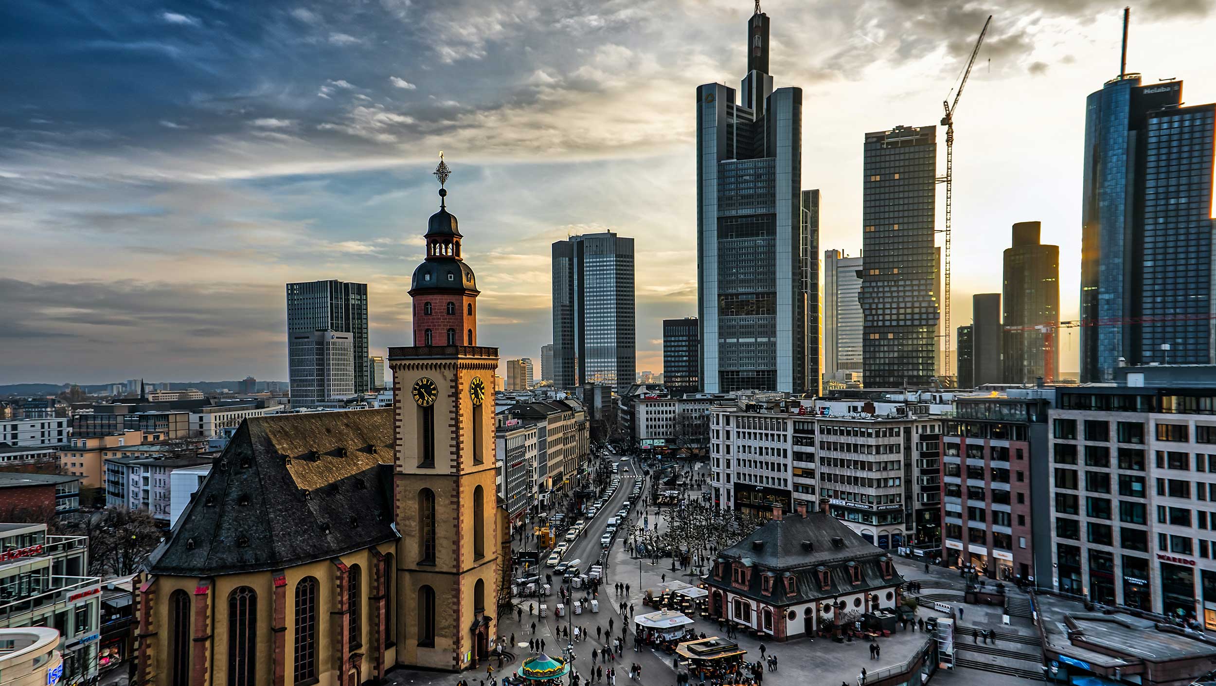 A view of a city with tall buildings in the background