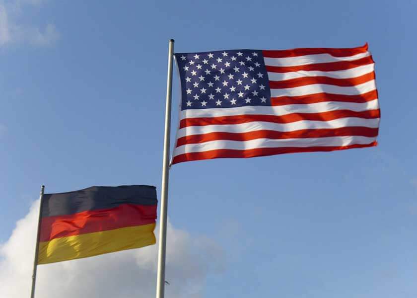 A close up of two flag